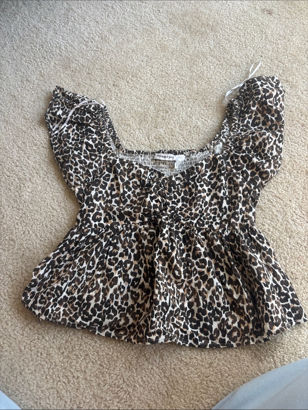 Very good condition leopard print womens baby doll top size medium